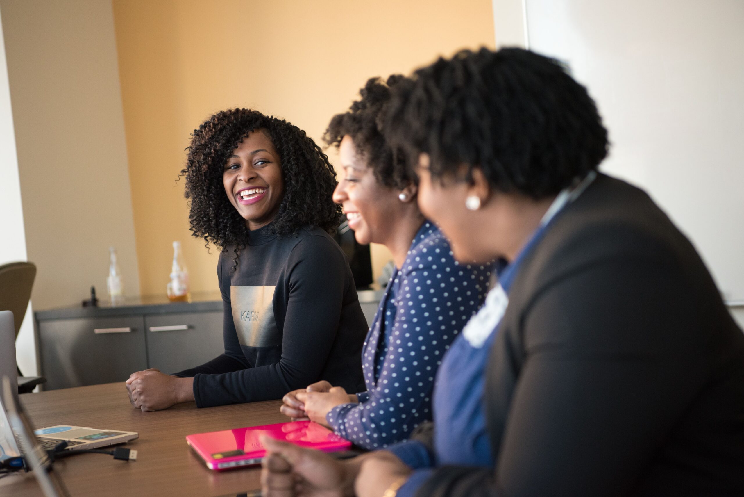Female students discussing wellbeing and gender equity
